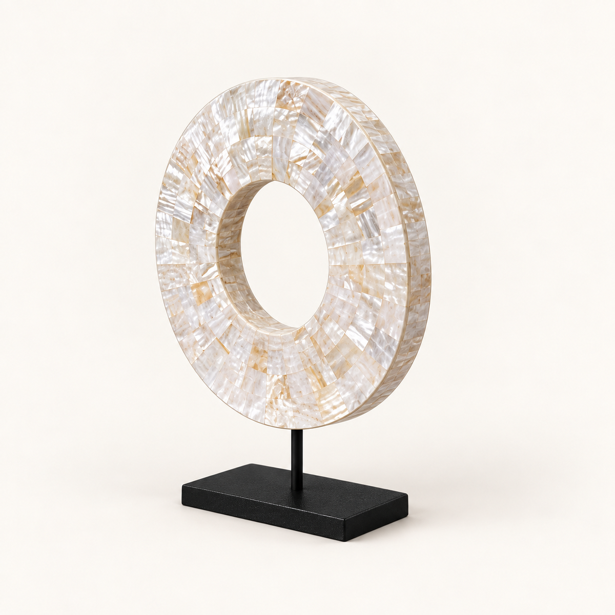 White Shell Disk on included black metal stand, angled view