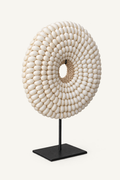 White Shell Rosette on black metal stand, three-quarter view